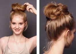 Tie the scarf at the base of the knot to cover the elastic band. Wrap It Up How To Create The Perfect Messy Bun