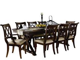 A modern refresh on the classic design, these spindle back chairs add some antique vibes to your dining table. Legacy Classic Thatcher 9pc Dining Set Trestle Table Six Side Chair The Furniture Space