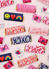 Simply center the christmas candy bar wrapper around the candy bar then gently fold the paper around the edges of the chocolate bar. Printable Valentine S Day Candy Wrappers