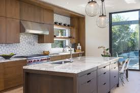 Vintage inspired warehouse lighting adds to the overall midcentury vibe. Tile By Style Mid Century Modern Kitchen Tile Fireclay Tile