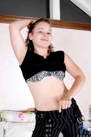 Teen Karma flicks perky peaks