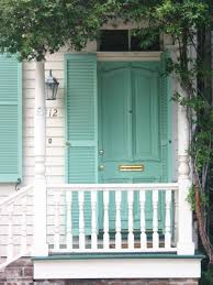 Just make sure to apply a sealant to the wood. Do Something Unexpected Bright Doors Aqua Front Doors Front Door Colors House Exterior
