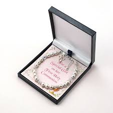 A first communion is an incredibly special event, which often becomes a lasting and unforgettable memory for many. First Holy Communion Bracelet On Card Jewels 4 Girls