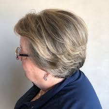 Hairstyles, kim kardashian, celebrity hairstyles, celebrity hair, kim kardashian hair, kim kardashian hairstyles, hairstyle ideas, kim kardashian haircuts, celebrity hairstyle evolution kim kardashian has tried a lot of hairstyles over the years, from her signature locks with a center part to her newest wavy style with bangs. 19 Flattering Hairstyles For Women Over 60 With Round Face Shapes