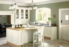Dark kitchen cabinets with light floors. The 7 Best Wall Colors For Kitchens Green Kitchen Walls Paint For Kitchen Walls Sage Green Kitchen Walls