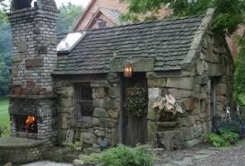 Integrate stone steps and a stone retaining wall into a challenging backyard slope to make the space. Handmade Stone Cottage Handmade Houses With Noah Bradley