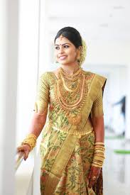 South Indian Bride Gold Indian Bridal Jewelry Temple Jewelry Jhumkis Gold Silk Kanchipuram Sari Braid Wit Indian Bridal Indian Bridal Wear South Indian Bride
