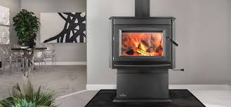 The cooking trivet deflects heat forward into the room while providing an attractive simmering spot. Napoleon S25 Wood Stove Wood Burning Stoves At Fireplacepro