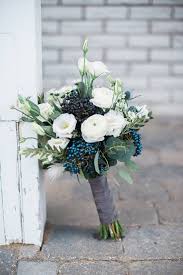 Purple ribbon wedding bouquet for a garden inspired romantic orlando wedding day | plan it event design & management. Wedding Bouquet Of Viburnum Berries Lysianthus Ranunculus And Thistle Tracey Jazmin Simple Wedding Bouquets Flower Bouquet Wedding Spring Wedding Bouquets