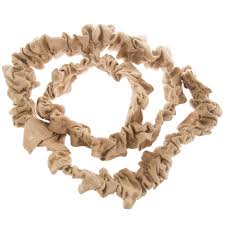 A toned decorative cord cover, which is great for hiding unsightly gold or brown electrical cords for lighting, surround speakers, or any other type of electronic equipment. Natural Burlap Decorative Cord Cover Hobby Lobby 55928