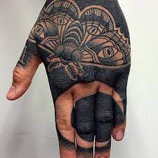 Blackout Tattoo Girl Google Search Hand Tattoos Moth Hand Tattoo All Black Tattoos