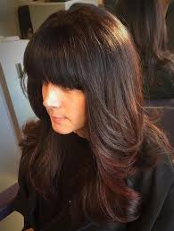 Layered long hair with bangs that graze the eyebrow. Pin On Hairstyles
