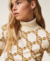 A necklace with a wider style pendant will create balance to the open space. Turtleneck With Chain Print Woman Beige Twinset Milano