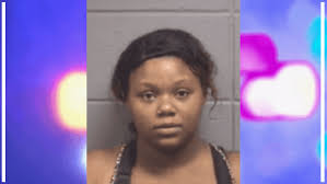 Woman arrested for hitting 10-year-old boy