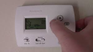 Learn how to set your thermostat and get tips on the auto setting, so it automatically turns on and off at a certain temperature to keep your room temperat. How To Program A Honeywell Thermostat Youtube