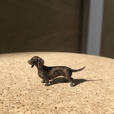 Heavy bikes in pakistan are sort of a passion for youngsters. Miniature Bronze Dachshund Sculpture 8th Anniversary By Ginger Rose Notonthehighstreet Com