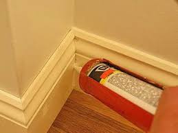 Applying Caulk To Inside Corner Joint To Fill Gaps Wood Trim Walls Wood Trim Caulking
