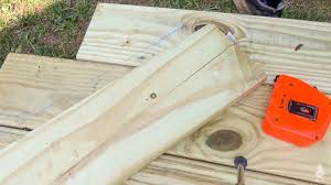 A simple and unscientific way to get a deck board to match the edge of an object such as a pool edge is by tracing the radius. Diy Floating Deck Part 4 Trimming Deck Boards And Rounding The Edges Ugly Duckling House