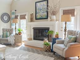 Textured pieces, such as a leather pouf and faux fur pillow, add charm while the color scheme creates a space that's livable for the whole clan. Family Room Makeover Reveal Just In Time For Spring Worthing Court