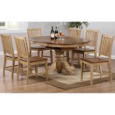 Wood dining tables handcrafted in vermont with solid, natural cherry, walnut, maple & oak. Sunset Trading 7 Piece Brook Round Or Oval Butterfly Leaf Dining Set With Slat Back Chairs