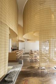 This bamboo structure was previously designed by bambubuild as an exhibition kiosk before finding new bamboo wall covering | bamboo matting for interior walls, ceiling and tiki bar. Best Designed Spaces To Eat And Drink Design Bamboo Decor Bar Interior Design Round Back Dining Chairs Bamboo Decor