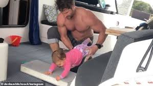 Soon after, he progressed at channel 7, where he worked as a researcher and producer on today tonight and then the times. Denham Hitchcock Shows Off His Buff Physique Exercising With His 11 Month Old Daughter Kaia Eminetra Co Uk