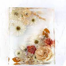 Flowers and other organic materials need to be thoroughly dried before they can be embedded in resin. 6 Ways To Preserve Your Wedding Flowers