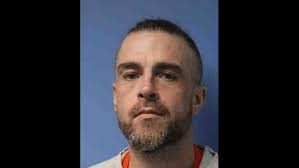 Parolee arrested after hourslong standoff in Wayne County