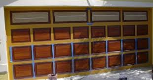 Pin By Susan Oliva On Diy Outdoor Curb Appeal Faux Wood Garage Door Garage Door Paint Garage Door Colors
