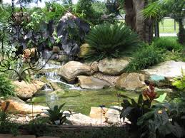 Landscaping contractors execute lawn, garden and hardscaping plans that have been drawn up by an architect or designer. Miami Landscape Design Lighting Firefly Landscape Contractors