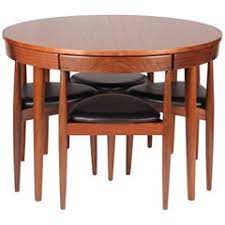 Our collection of dining room furniture include perfectly coordinated tables, chairs, sideboards and cabinets for effortless furnishing. Scandinavian Modern Dining Table And Six Chairs Model Roundette By Frem Rojle At 1stdibs