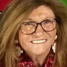 The Educated Debutante added a...