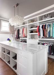 There's minor assembly required because the shelf hangs from metal rods that slide through the fabric loops at the top. Big Closet Top Shelf For Traditional Closet Also Ceiling Lighting Corner Closet Pocket Doors Storage Boxes Wainscoting Walk In Closet Wood Flooring Finefurnished Com