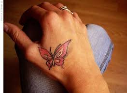 Violet butterfly with semi colon body tattoo. 54 Awesome Butterfly Tattoos On Hand