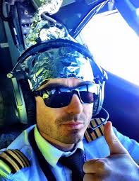 Ryanair pilot calls passengers 'morons' and takes tinfoil hat selfie in the  cockpit