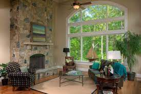 Whether treated individually or as a group, multiple windows in a room require clever window treatment ideas. How To Decorate A Living Room With Large Windows