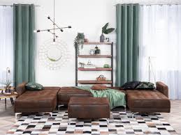 The reclining chair and matching ottoman are upholstered in bonded leather for top quality and lasting comfort. 5 Seater U Shaped Modular Faux Leather Sofa With Ottoman Brown Aberdeen Furniture Lamps Accessories Up To 70 Off Avandeo Online Store