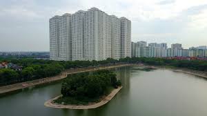 Rising from a Hanoi isle, a city within a city