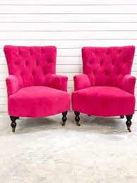 If the chair has arms, the armrests should be high enough to provide comfortable support for your forearms and elbows. Louise Hot Pink Chair