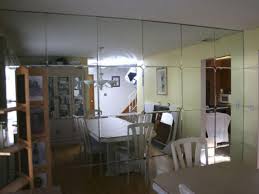 Welcome to a very extra diy mirror wall! Replacing Mirror Panels With Drywall Hgtv