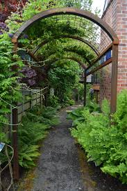 The Home Of Marcia Westcott Peck Landscape Design One Of The Pacific Northwest S Most Innovative Landscap Garden Arches Landscape Design Northwest Landscaping