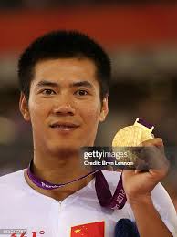 Jon-Allan Butterworth of Great Britain and coach Chris Furber speak... News  Photo