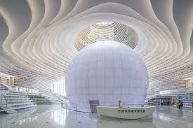 Holding earth and green tree in hands, world environment day concept, saving growing young tree. A Selection Of The World S Best Architects Archdaily