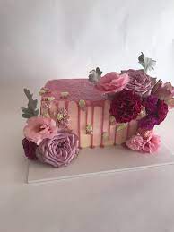 Buttercream flowers sheet cake on the tiered cake. Rectangle Cake Rectangle Cake Girly Cakes Pretty Birthday Cakes