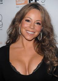 Carey drops the diva act