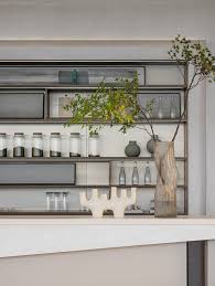 印际 纳沃设计 金科大连春暖花开营销中心 floating shelves decor home decor