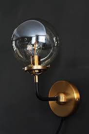 Brass Glass Globe Wall Light From Rockett St George Wall Lights Globe Wall Light Modern Bathroom Light Fixtures