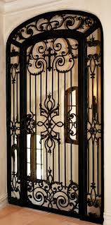 The typical spanish color palette is a warm mix of neutrals and earth tones, such as rusty orange and moss green. Love This Iron Door W Cross Old World Mediterranean Italian Spanish Tuscan Homes Design Decor Wrought Iron Doors Iron Doors Tuscan Decorating