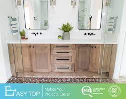 But, metal and plastic become more and more popular. China Eco Friendly Commercial Wooden Bathroom Nature Solid Wood Vanity Cabinet China Pvc Bathroom Cabinet Bath Vanity