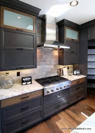 Designed to accent the curves and contours of each piece, aged pewter beautifully integrates the traditional and eclectic. Remodelaholic 40 Beautiful Kitchens With Gray Kitchen Cabinets